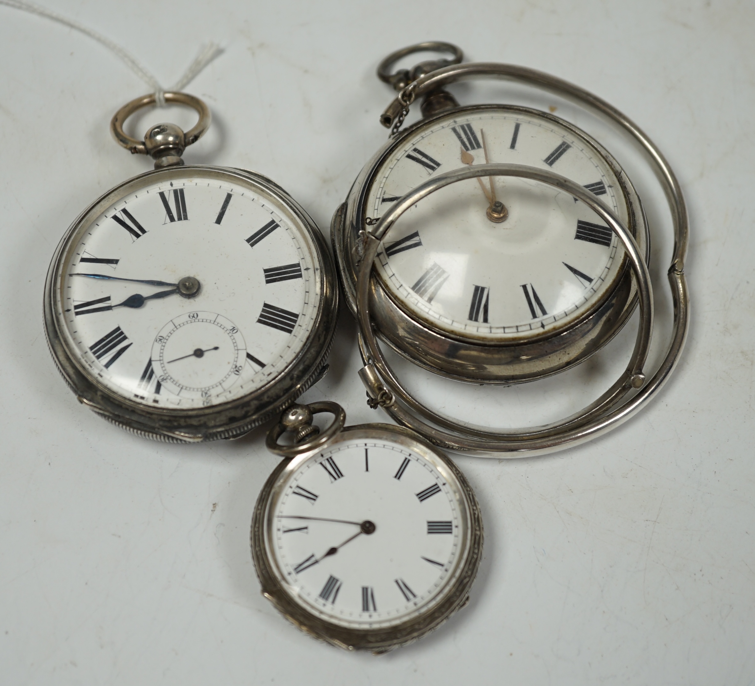 A George III silver pair cased verge key wind pocket watch, by John Thomas, London, one other later silver pocket watch, a white metal fob watch and two silver hinged bangles.